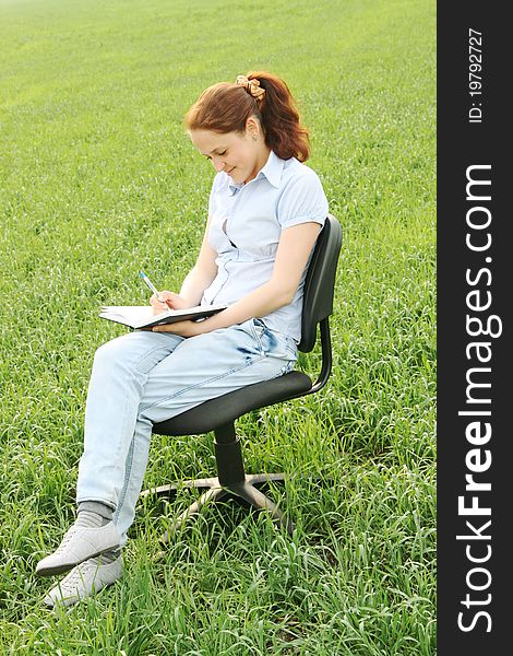 The Girl Sitting In The Field