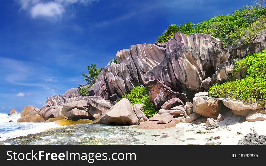 Granite rocky beach on La digue island. Granite rocky beach on La digue island