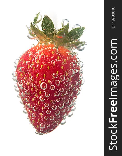 Strawberrie in water bubble over white background