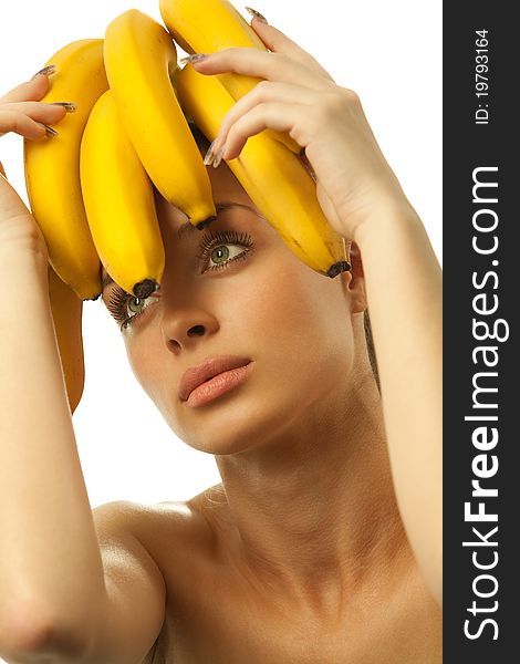 Shot of pretty girl with bananas over head. Food concept, healthcare. Shot of pretty girl with bananas over head. Food concept, healthcare.