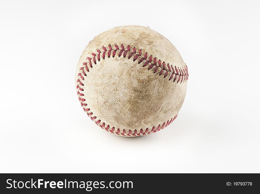 A baseball against a white background. A baseball against a white background