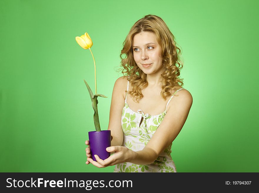 Happy Young Woman Hugging Flower