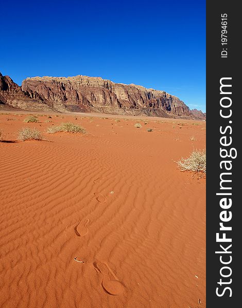 Footprints in the red desert in Jordan