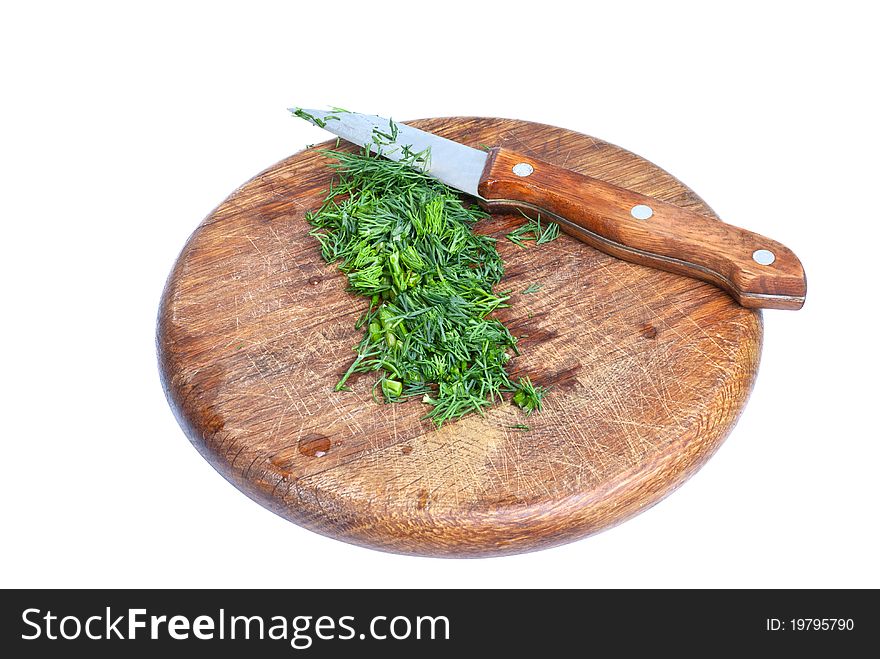 A dill on board, isolated on white