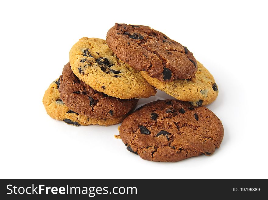 Brown and yellow chocolate chips biscuits isolated on white background