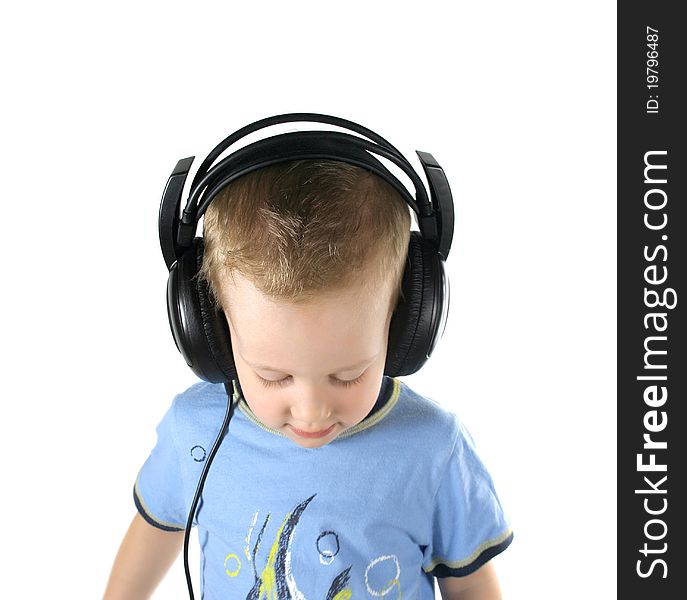 Little DJ boy looking down on a white background
