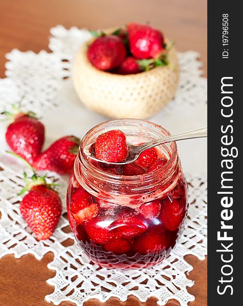 Strawberry jam and fresh strawberries