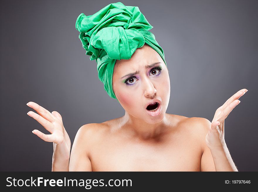 Angry young woman shout gesturing looking at camera