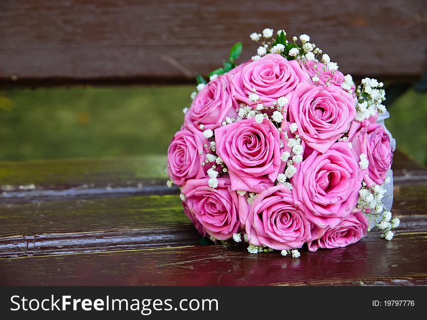 Bridal bouquet on the old bench. Bridal bouquet on the old bench