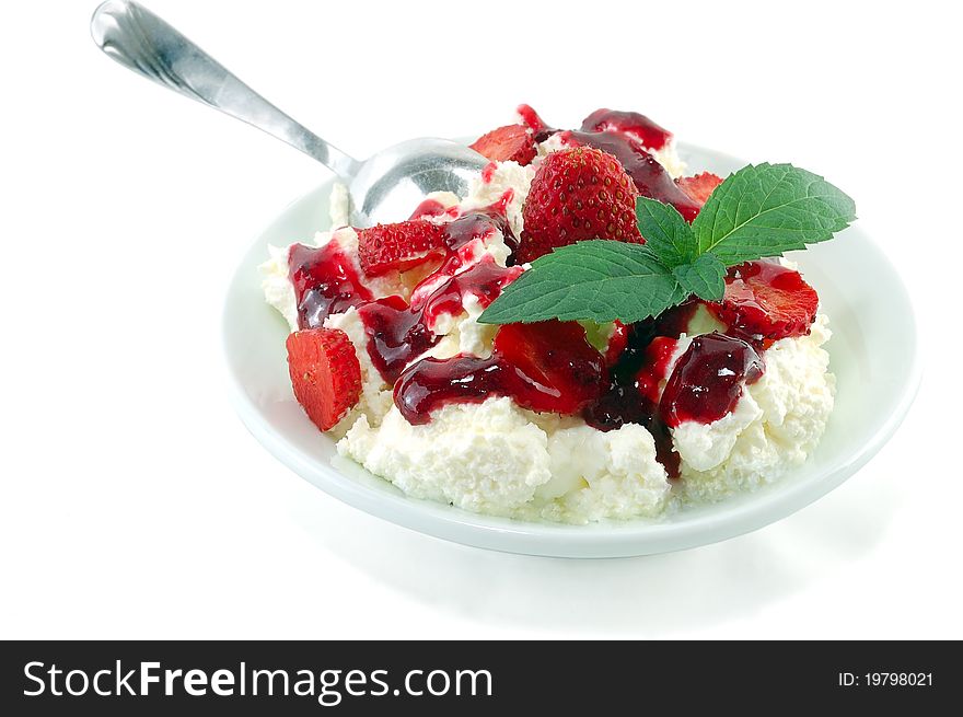 Dessert from cottage cheese with a strawberry isolated on a white background