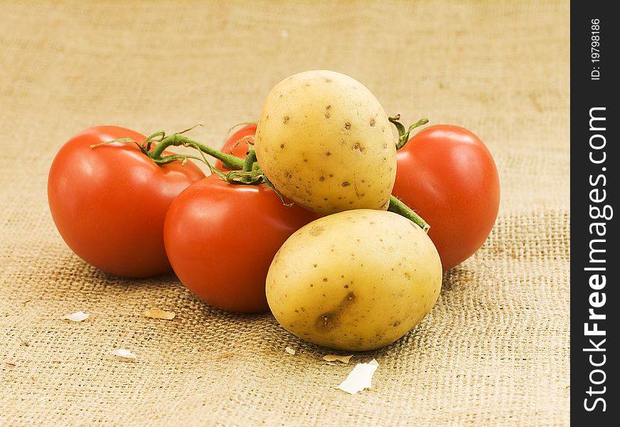 Organic red tomatoes and potatoes. Organic red tomatoes and potatoes