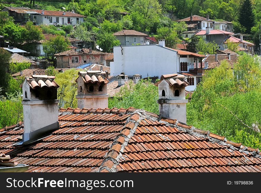 Chimneys and roofs in the neighborhood in Veliko Tarnovo in Bulgaria. Chimneys and roofs in the neighborhood in Veliko Tarnovo in Bulgaria
