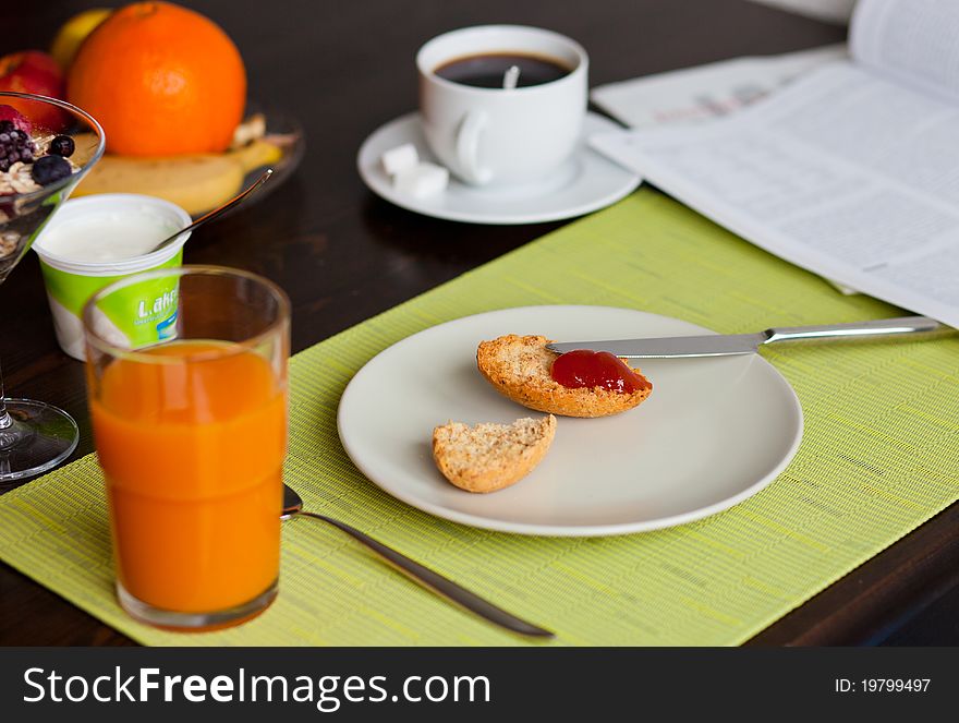 Deliciouse breakfast with toast, jam, coffey and orange juice. Deliciouse breakfast with toast, jam, coffey and orange juice