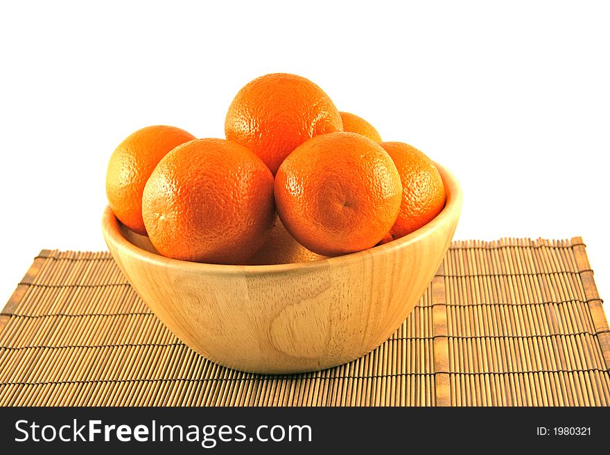 Oranges in a wooden basket. Oranges in a wooden basket