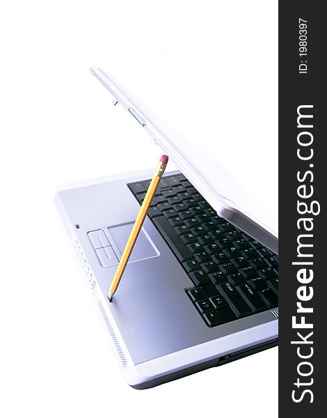 Nice Blue Laptop Hold Open By A Yellow Pencil