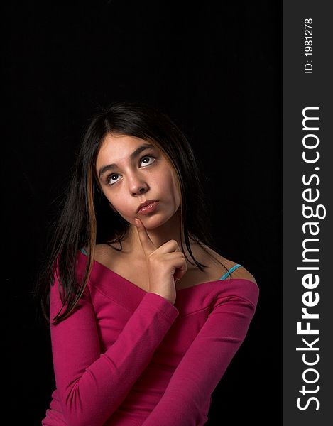 Teen posing and improvising over black backdrop. Teen posing and improvising over black backdrop
