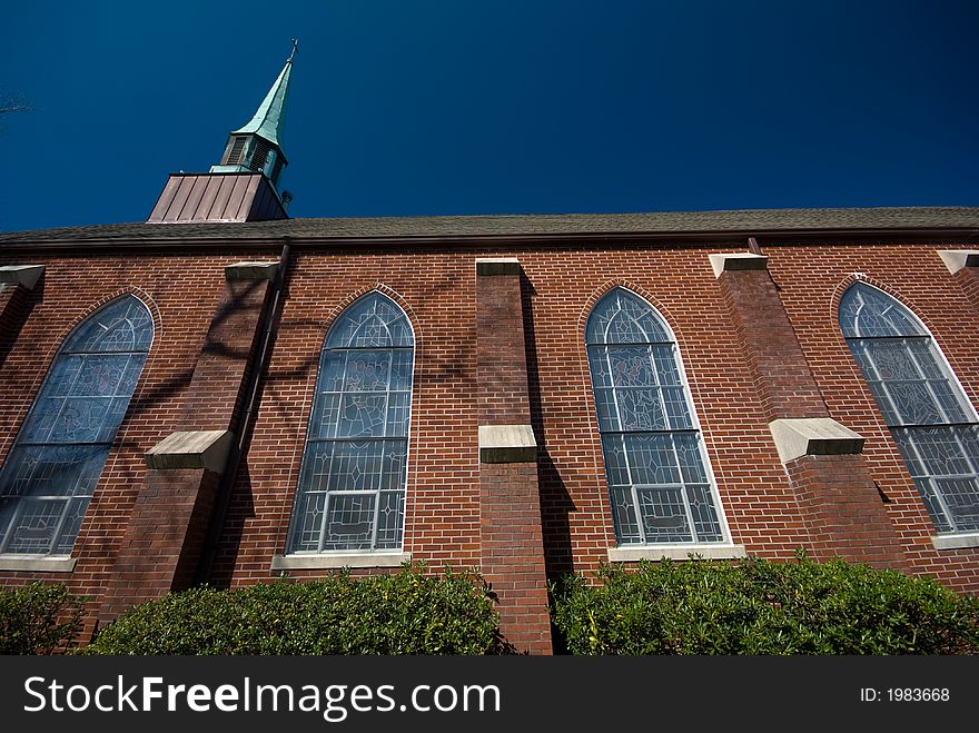 Exterior of an old Lutheren church in charleston south carolina with blue sky as background. Exterior of an old Lutheren church in charleston south carolina with blue sky as background