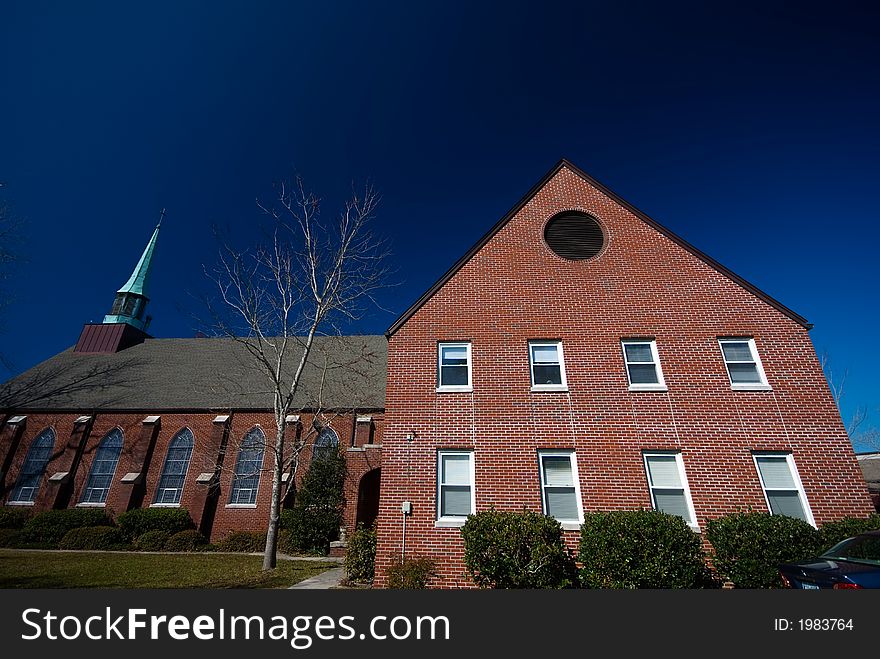 Exterior of an old Lutheren church in charleston south carolina with blue sky as background. Exterior of an old Lutheren church in charleston south carolina with blue sky as background