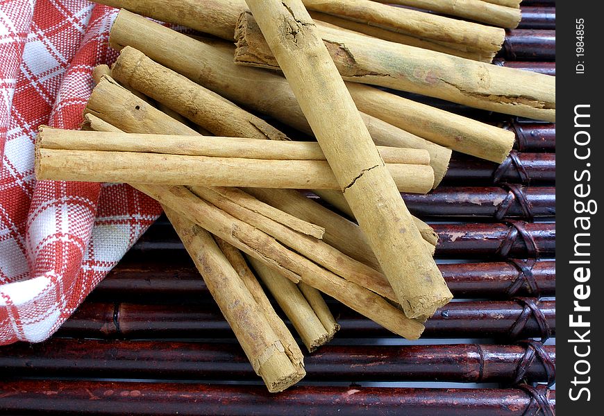 Cinnamon sticks with a brown cloth