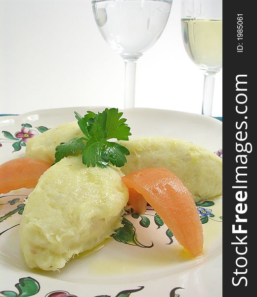 Preparing a brandade of cod arranged on a plate with glasses. Preparing a brandade of cod arranged on a plate with glasses