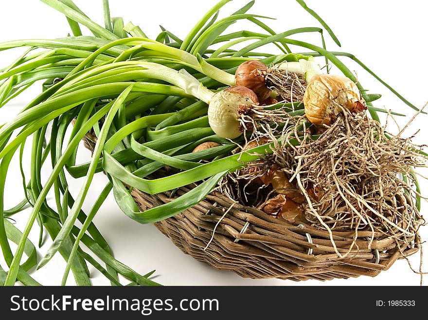Basket with an onions-components of a healthy feed