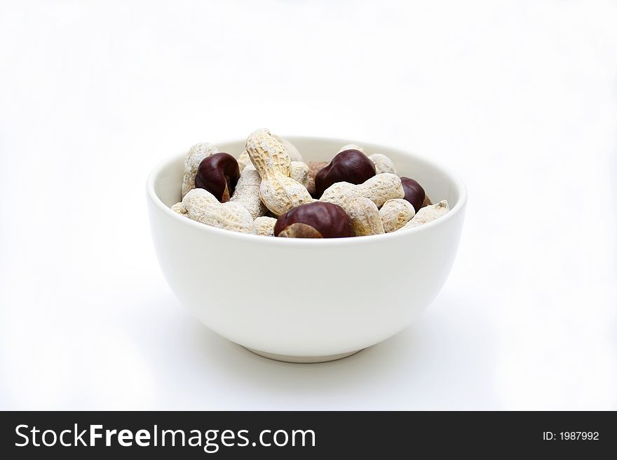 Peanuts and cestnuts in a bowl