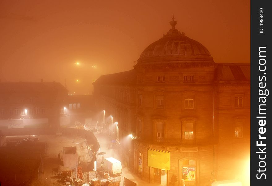 Old building in orange fog