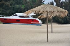 Beach Sand And Red Yacht Royalty Free Stock Photo Beach Sand And Red Yacht Royalty Free Stock Photo