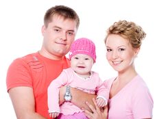 Happy Young Famile With Beautiful Baby Royalty Free Stock Photo