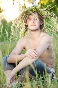 Young Man Sit On Grass Royalty Free Stock Photography