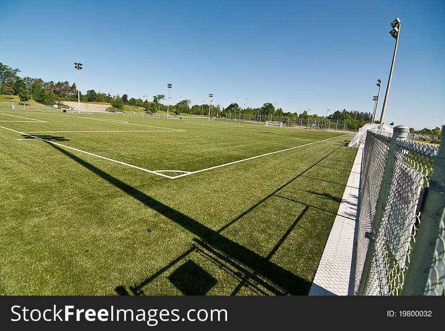 A newly constructed soccer field with artificial turf. A newly constructed soccer field with artificial turf.