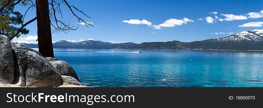 Lake Tahoe panorama with few clouds on sky