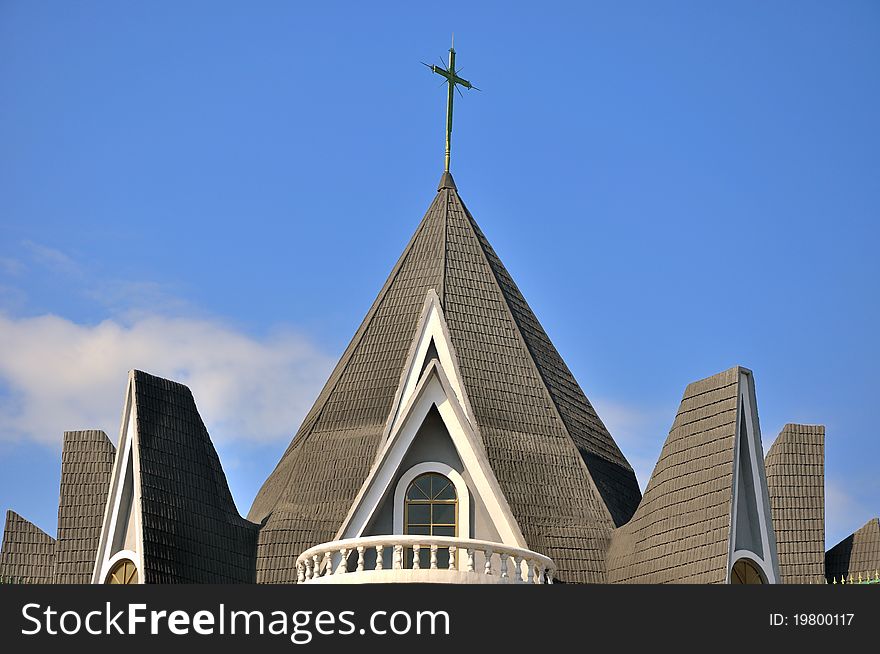 Roof of church building under sky