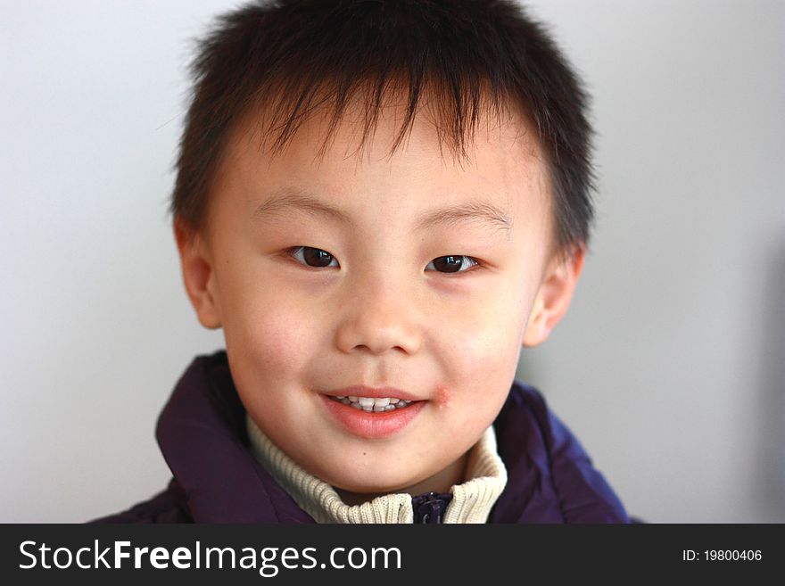 The portrait of an Asian boy