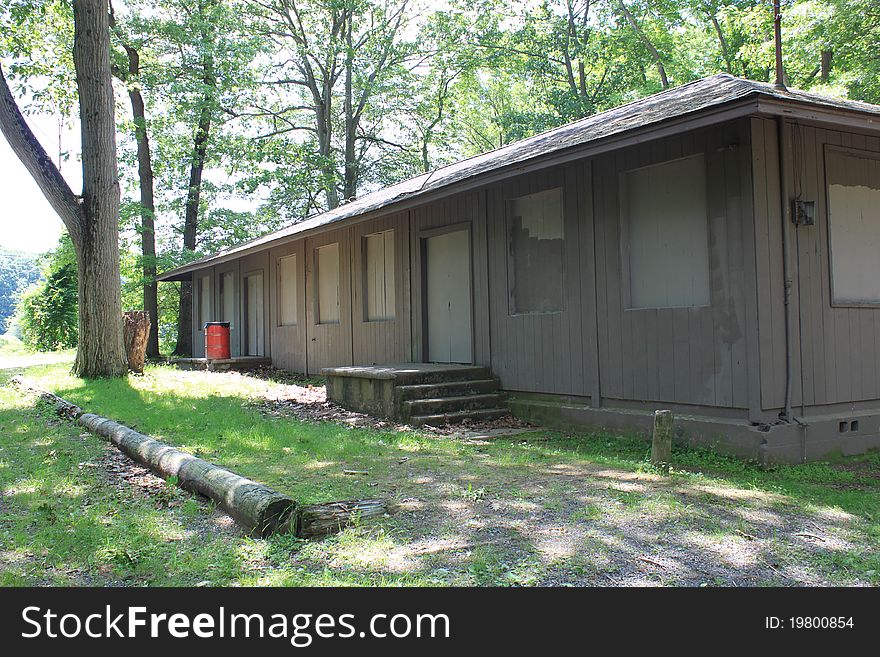 An abandoned camping building in a small park. An abandoned camping building in a small park