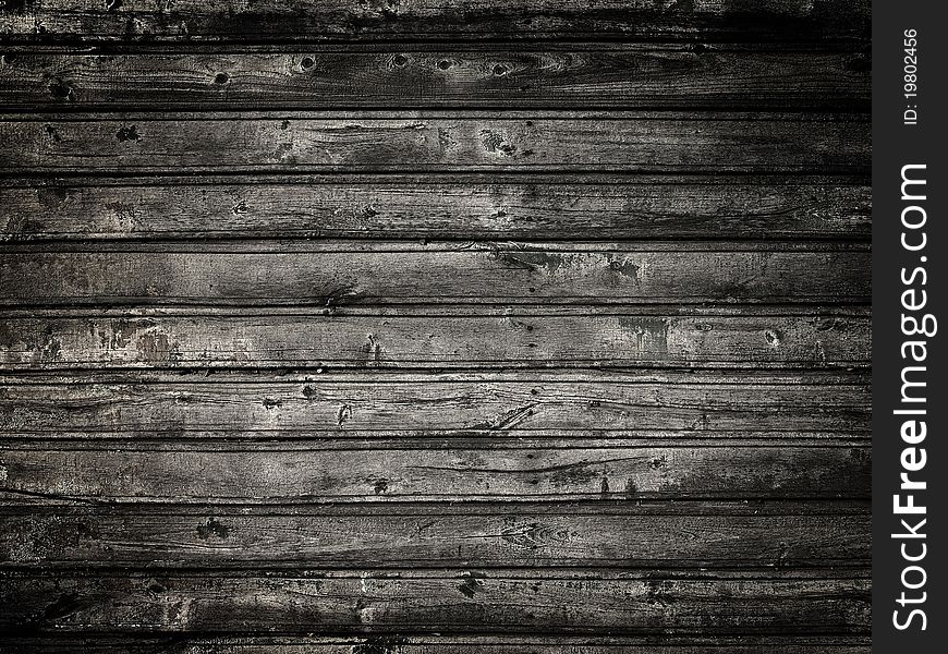 Black wooden planking closeup background. Black wooden planking closeup background.