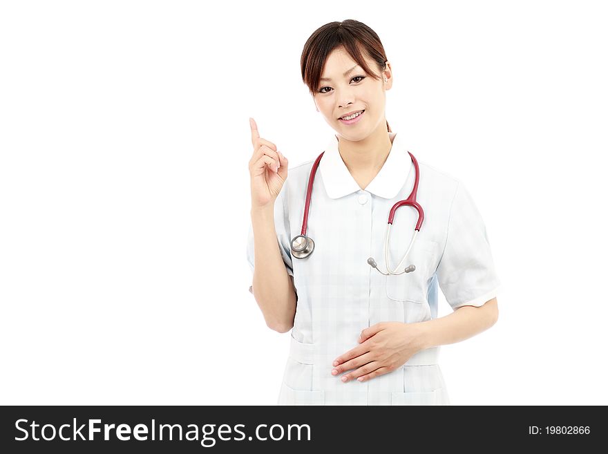 Young asian female nurse pointing