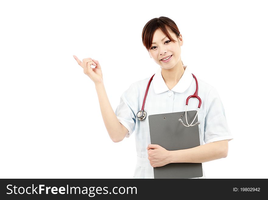 Young asian female nurse pointing