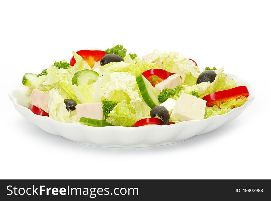 Salad in plate on white