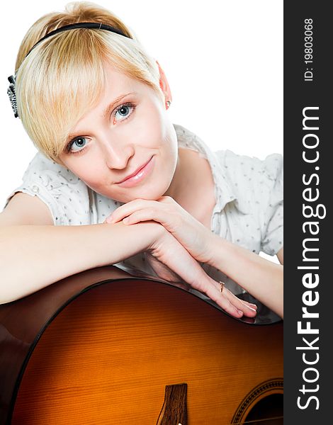 Blond woman with guitar on isolated white