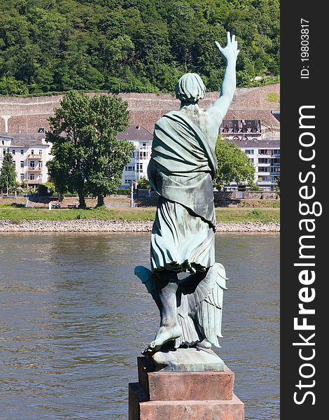 A statue of Josef Goerres waving across the River Rhine in Koblenz. A statue of Josef Goerres waving across the River Rhine in Koblenz