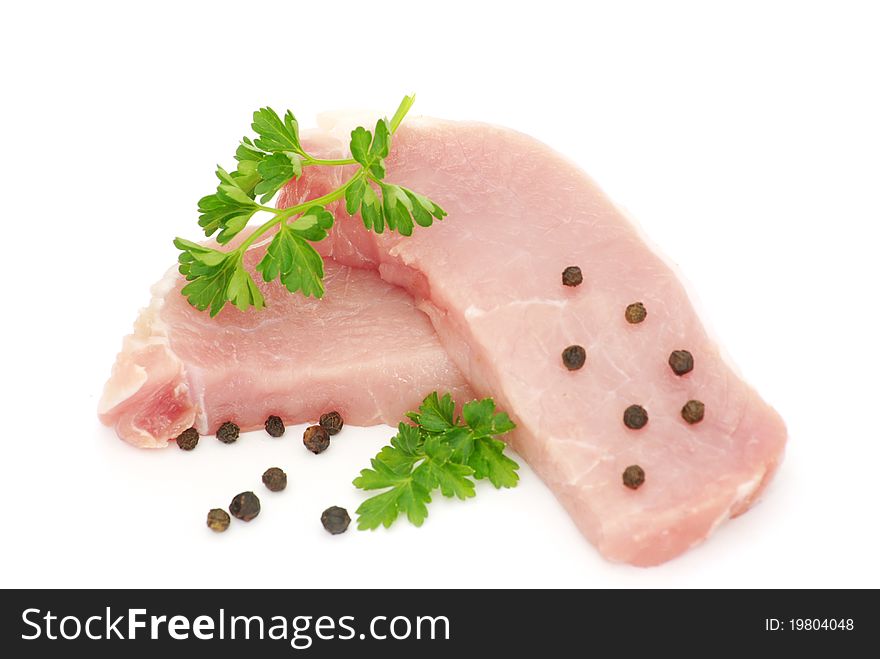 Pieces of crude meat with parsley and fennel