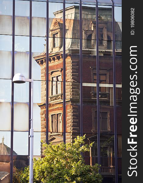 Beautiful building and reflection on glass and modern building. Beautiful building and reflection on glass and modern building