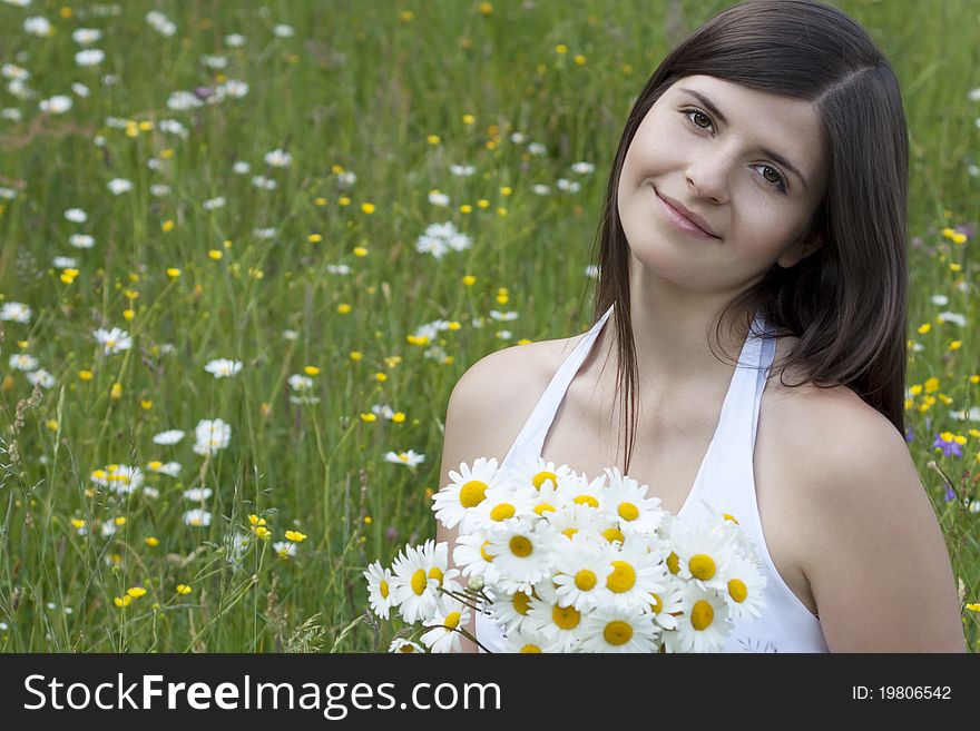 Beautiful girl with flowers