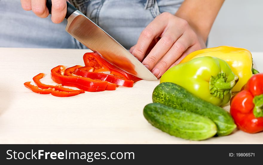 Closeup woman cooking salad