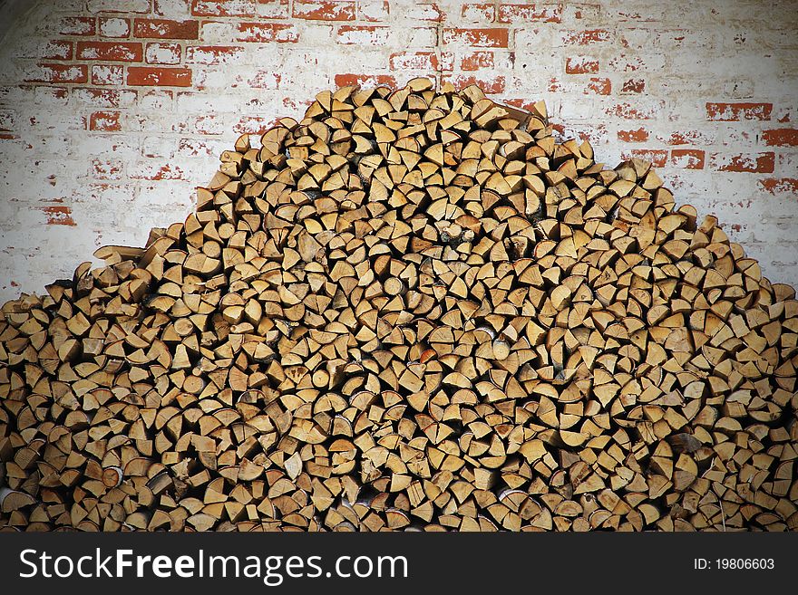 Wood stack pile of firewood background