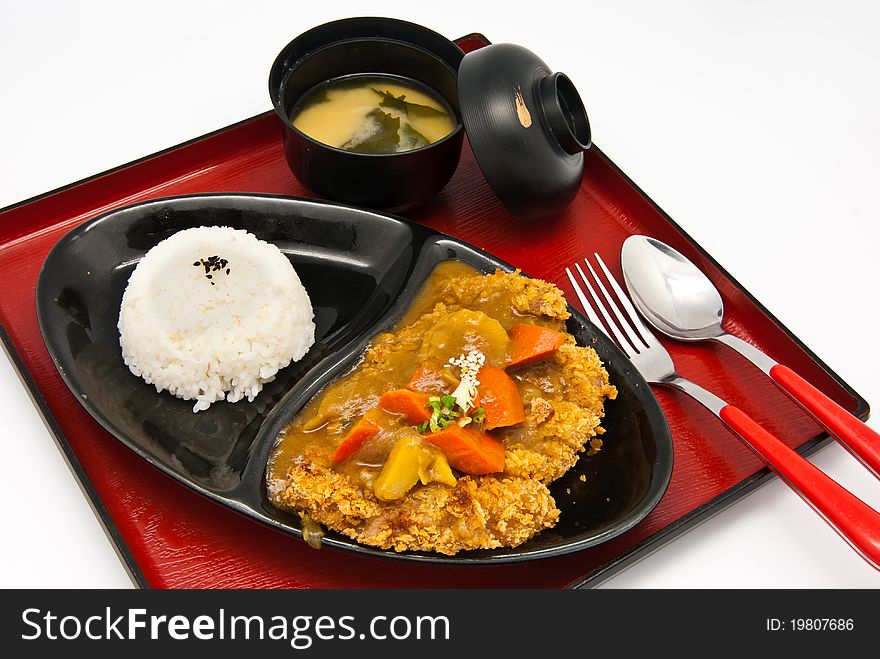 Bento, Japanese food style , fried chicken and rice and soup on white background. Bento, Japanese food style , fried chicken and rice and soup on white background