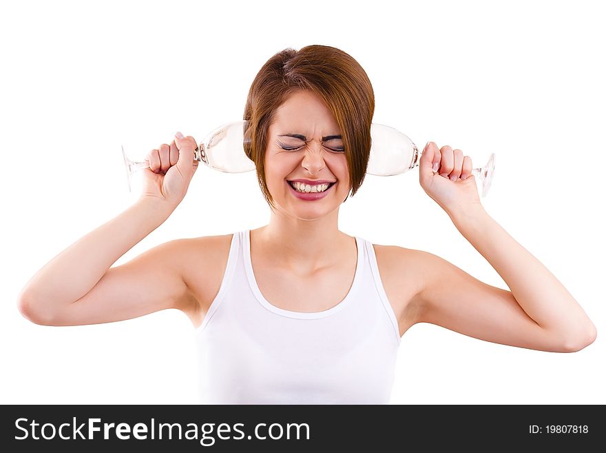 Young woman is closing her ears with glasses. Young woman is closing her ears with glasses