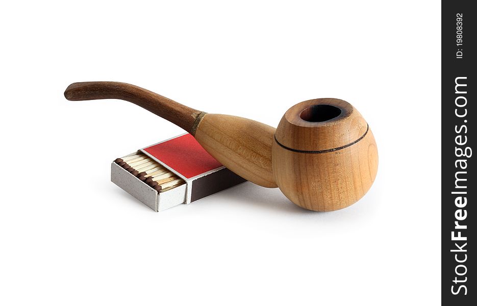 Wooden tobacco pipe and open matchebox on white background. Isolated with clipping path. Wooden tobacco pipe and open matchebox on white background. Isolated with clipping path