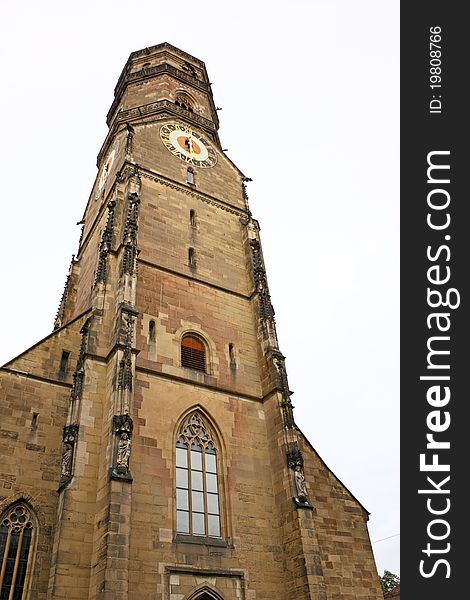 Tower in Gothic style  of Stiftskirche church in Stuttgart, Germany, destroyed by the bombing raids 1944, restored in the 1950s but not in all details. Tower in Gothic style  of Stiftskirche church in Stuttgart, Germany, destroyed by the bombing raids 1944, restored in the 1950s but not in all details